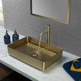 Close up product lifestyle image of the JTP Vos Brushed Brass Tall Basin Mixer